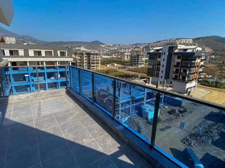 id1130a-two-level-apartment-with-sea-and-mountain-views-kargicak-area (30)