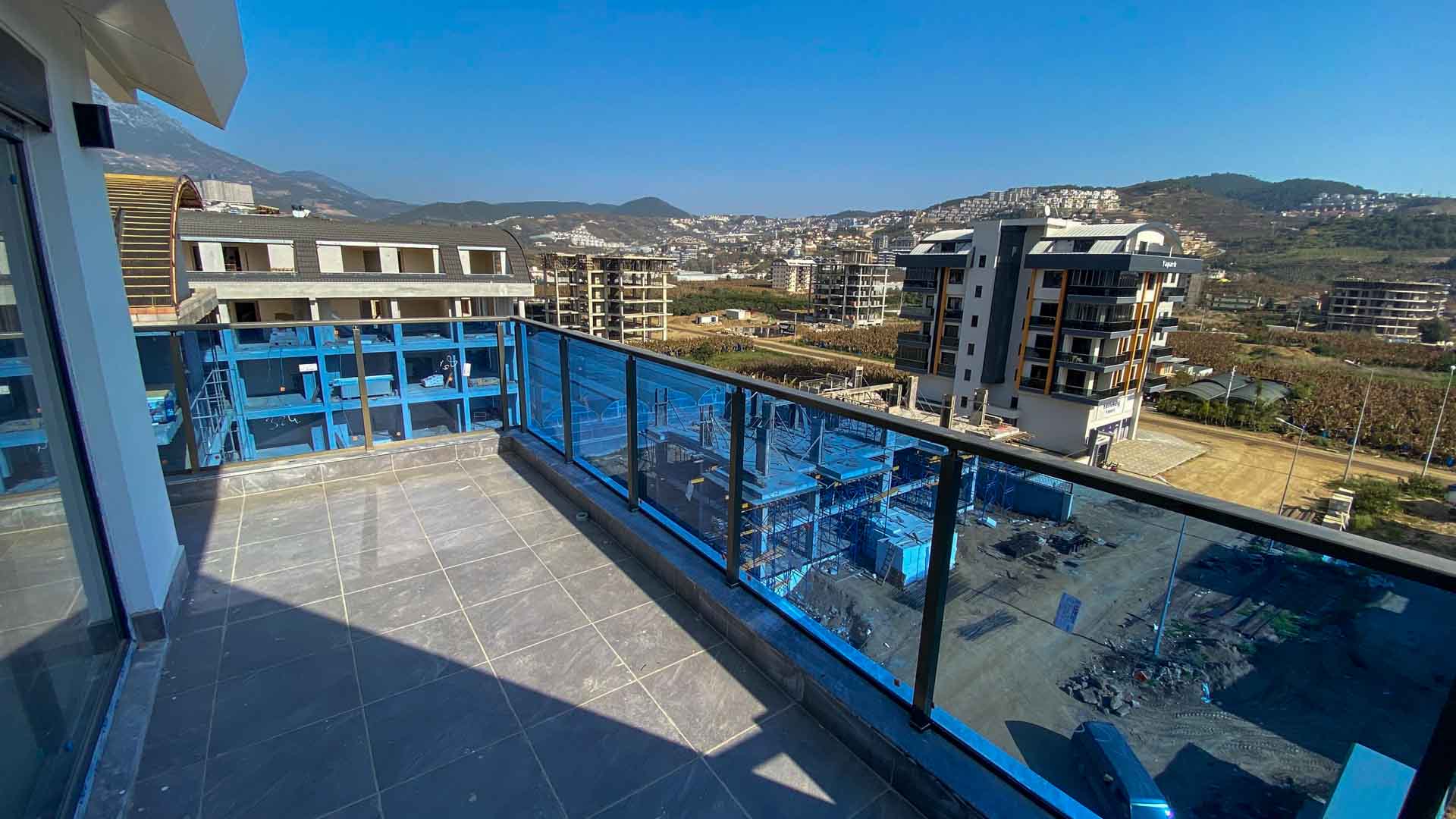 id1130a-two-level-apartment-with-sea-and-mountain-views-kargicak-area (30)