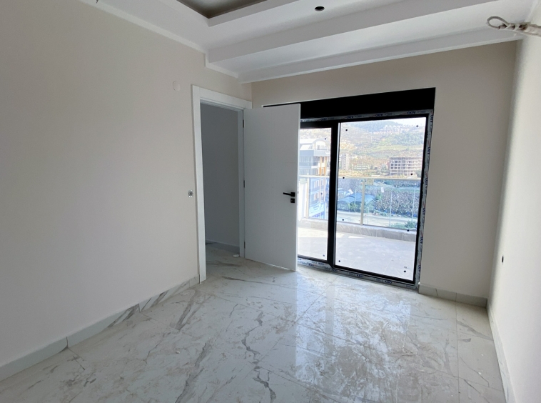 id1130a-two-level-apartment-with-sea-and-mountain-views-kargicak-area (43)