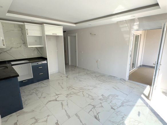 ID1277A 1+1 apartment with a good square in a new building in the center of Mahmutlar