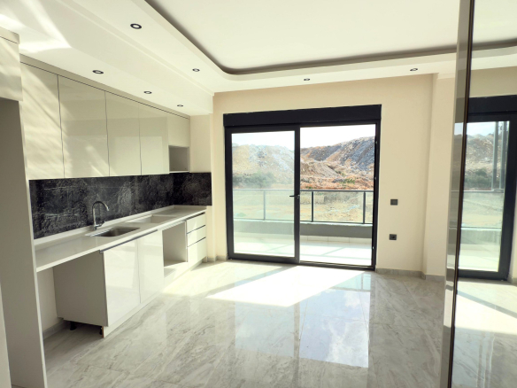 ID1343A 1+1 apartment with sea and fortress views in a premium complex in Oba