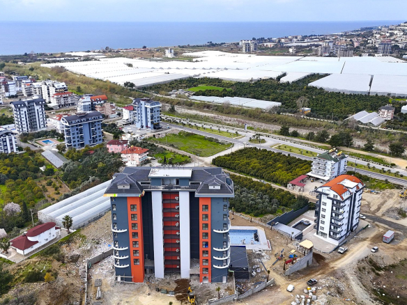 ID1369 1+1 apartment with a view of the coast in a new complex in Demirtas