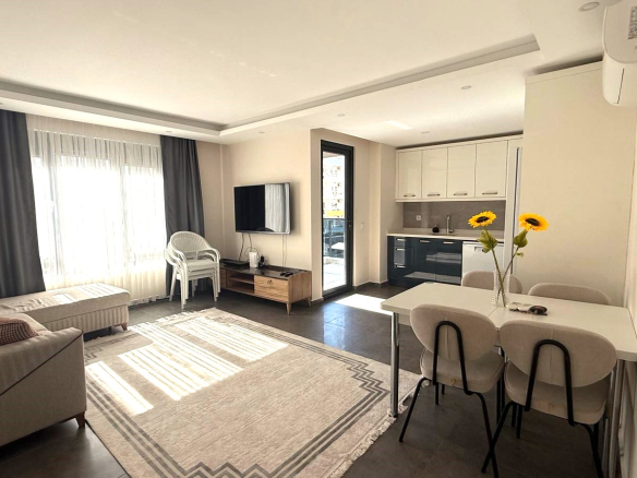 ID1377A Spacious 2+1 apartment with furniture and excellent location in Mahmutlar