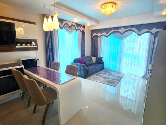 ID1378 Furnished 2+1 apartment with sea view in Mahmutlar