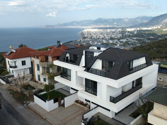 ID1387a 4+1 Modern villa with a view of the coast in Kargicak