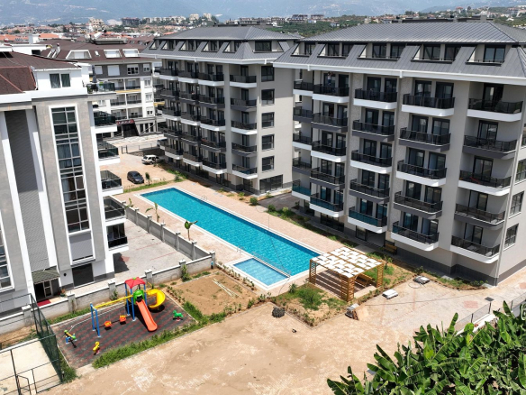 ID1396a Furnished 1+1 apartment with sea and pool view in Kestel