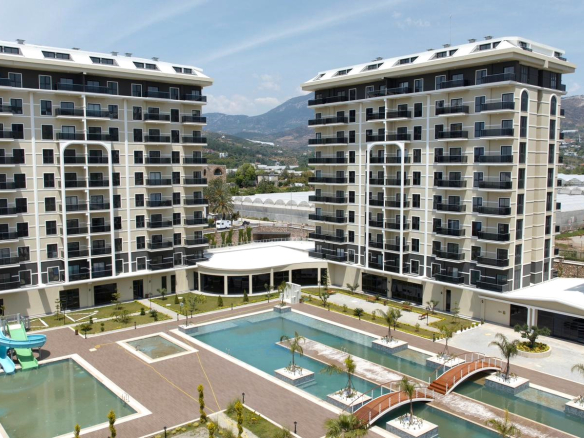 ID1407a 1+1 apartment with mountain peak view in a premium complex in Demirtas